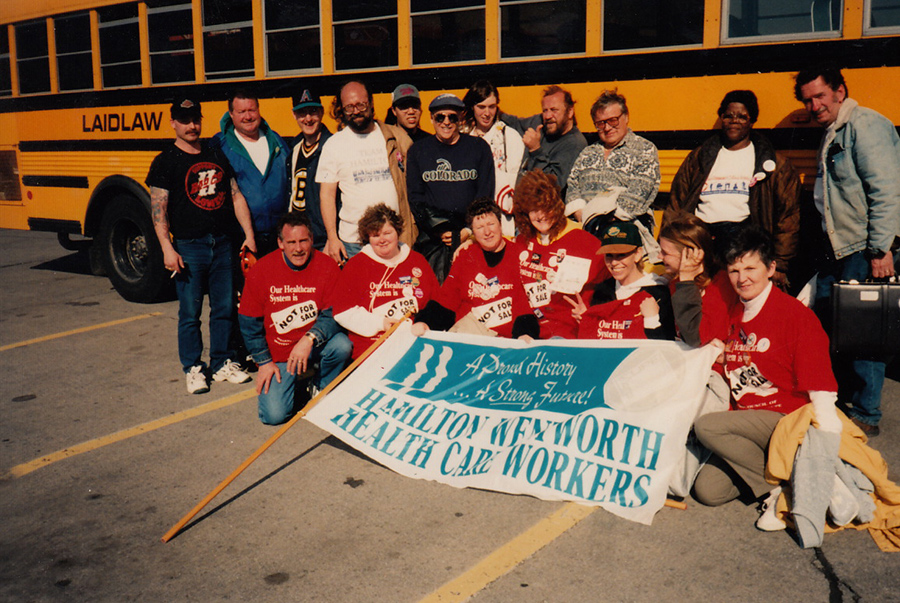 Bus to Ottawa, Local 5 and 167 members Tim Rhor, Chris Holland, Darlene Fortney Ed Thomas, Fred Loft, Jack Ambridge, Geneva Neil are pictured, ca. 1992. Courtesy of Ed Thomas.