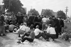 Strikers sat and lay down on the road to prevent traffic from entering the city’s east end dump. Some were arrested for obstructing the police, 1950. Courtesy of The Hamilton Spectator Collection, Local History & Archives Department, Hamilton Public Library.